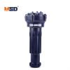 A 100mm DTH bit with a DHD3.5 shank for geotechnical drilling
