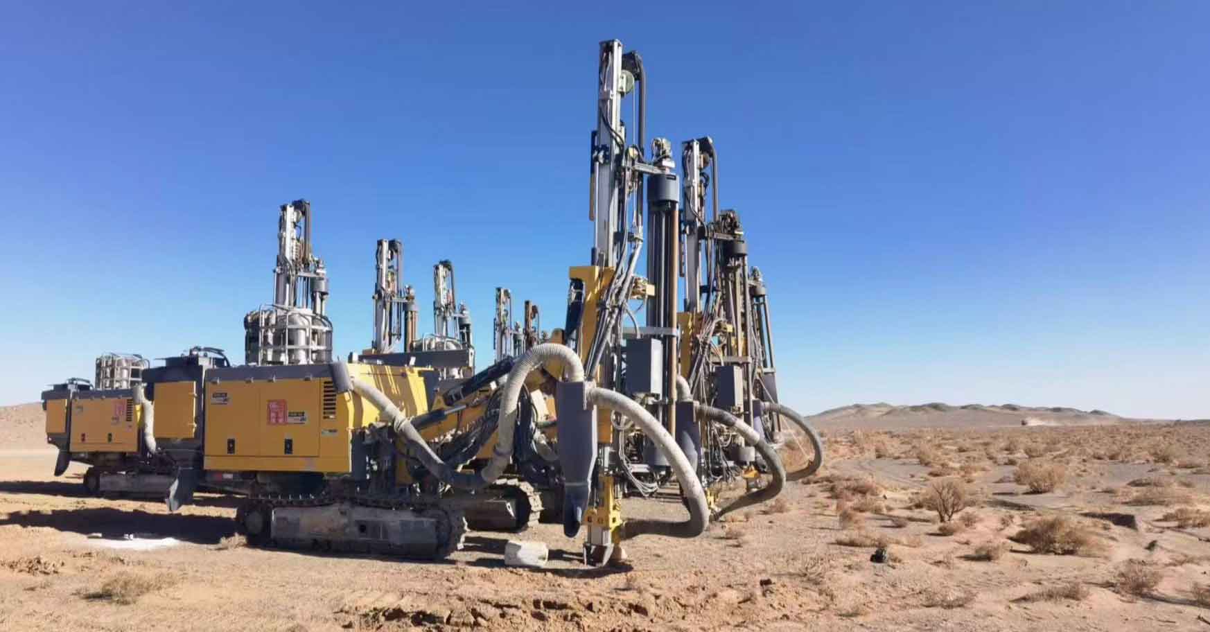 DTH-and-top-hammer-drill-rigs-in-mining-excavation-operation.jpg