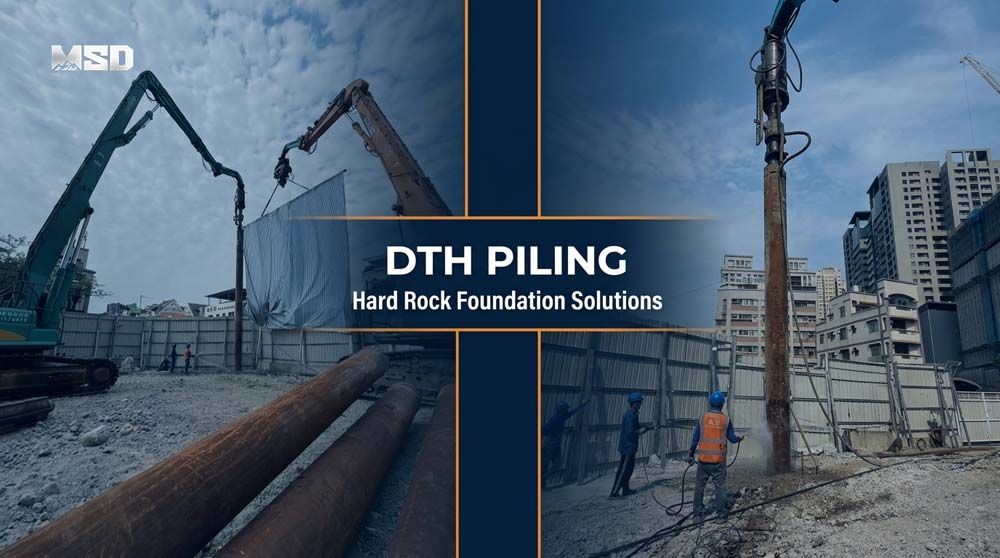 DTH-piling-rig-driving-steel-casing-into-hard-rock-at-a-construction-foundation-site.jpg